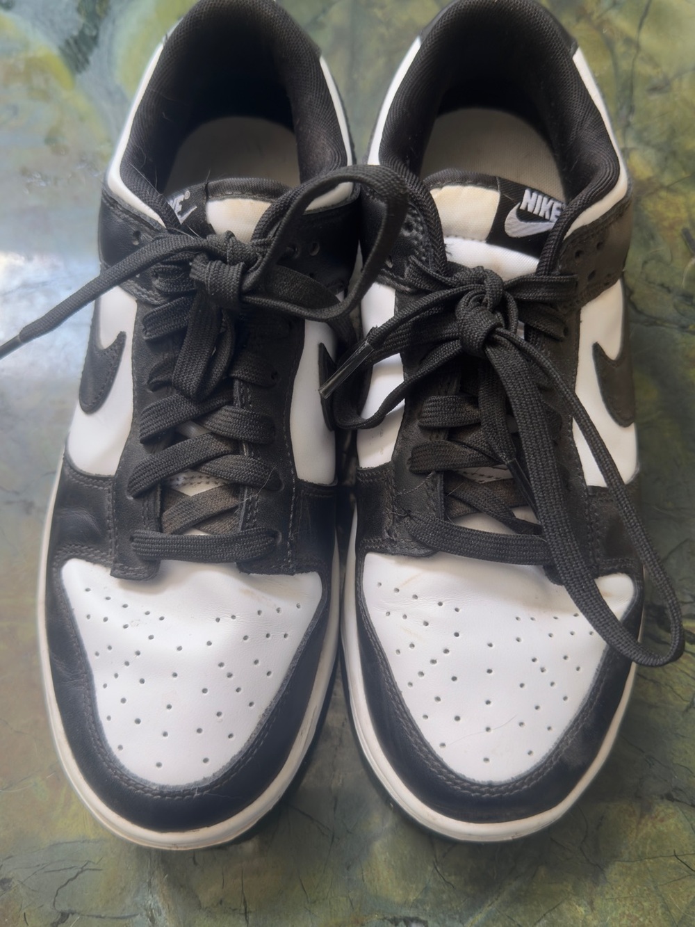 Nike women’s Black and White Low-Top Sneakers